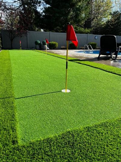 Private putting range by the poolside