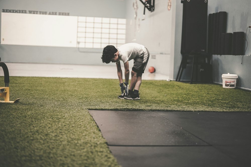 A home gym with artificial turf