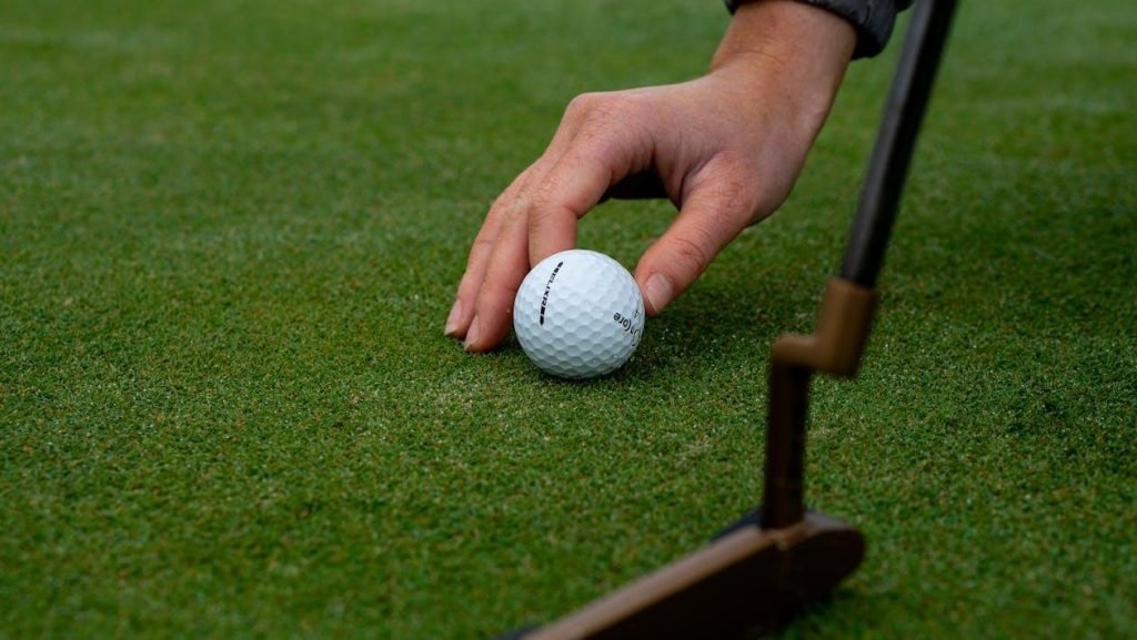 Golf ball on synthetic grass