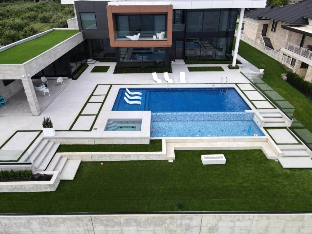 Synthetic grass used for a backyard around a pool