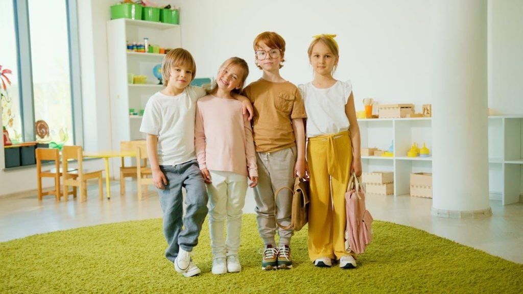 Children standing on artificial turf