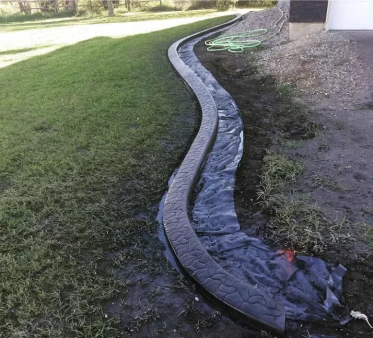 Low-maintenance artificial grass installation creating a green backyard in Essex