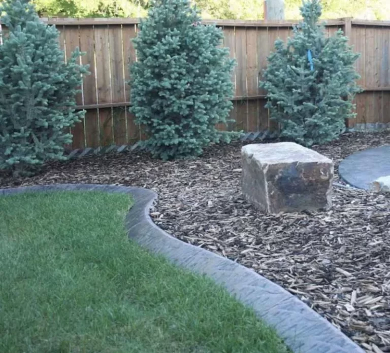 Modern landscape design in Windsor featuring a professionally installed artificial grass lawn