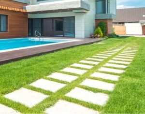 Landscaped modern house with artificial lawn and pool
