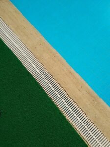 Poolside next to artificial turf