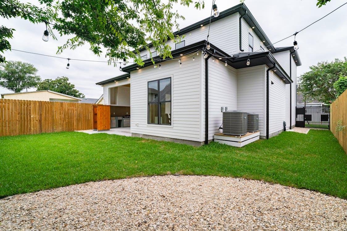 low maintenance backyard with artificial grass