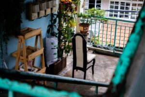 vertical greenery setup for a small balcony in an outdoor space