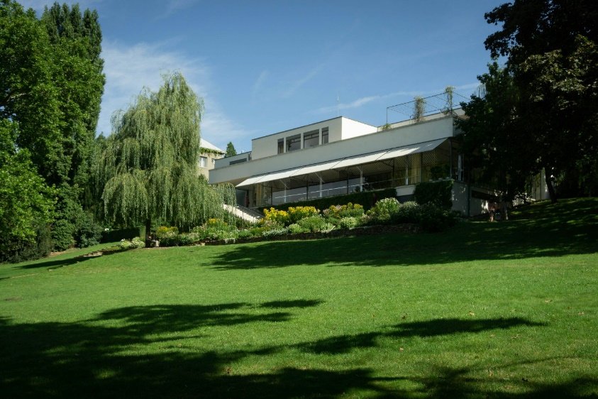 An image of a house with a garden