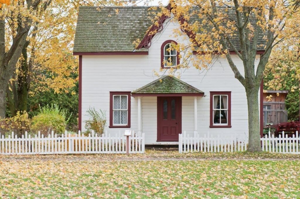 a home with a lawn covered with snow