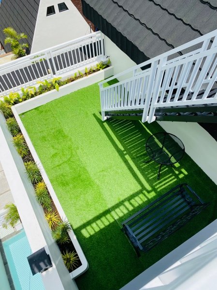 Water-saving artificial turf landscape installation for a Windsor residential property